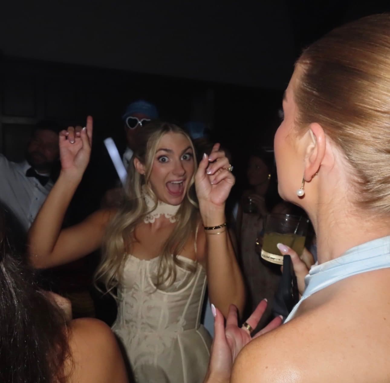 laughing on the dance floor at the after-party