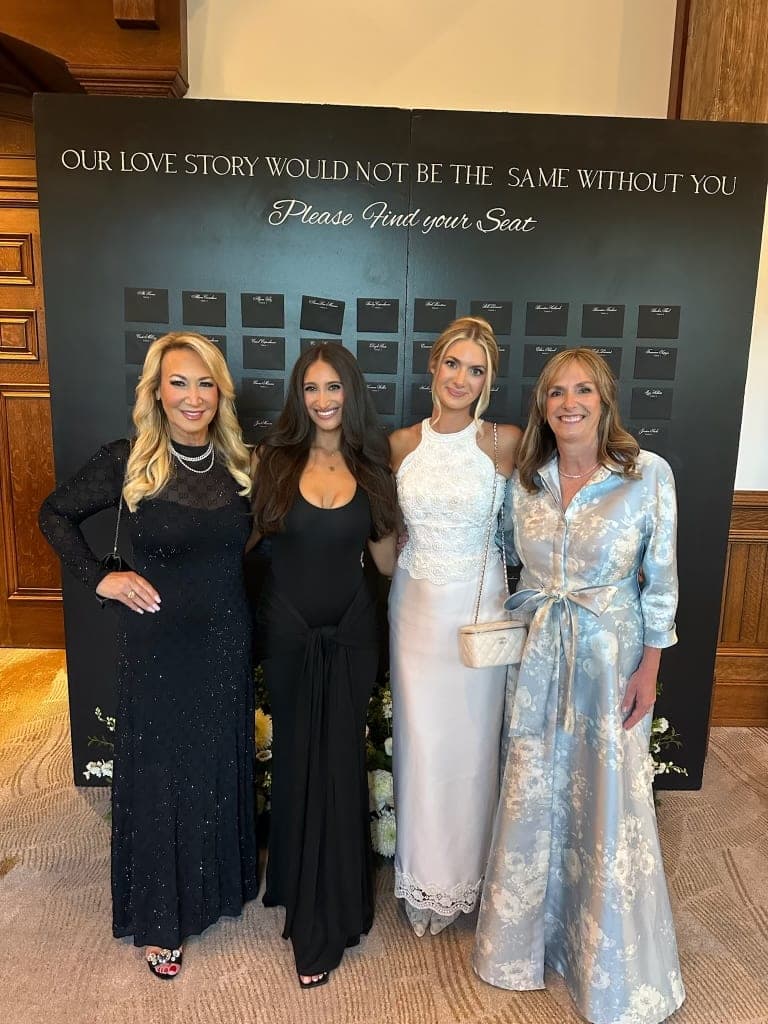 the moms in front of the seating board
